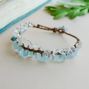 Brown waxed cord detail on handmade aquamarine and clear quartz bracelet
