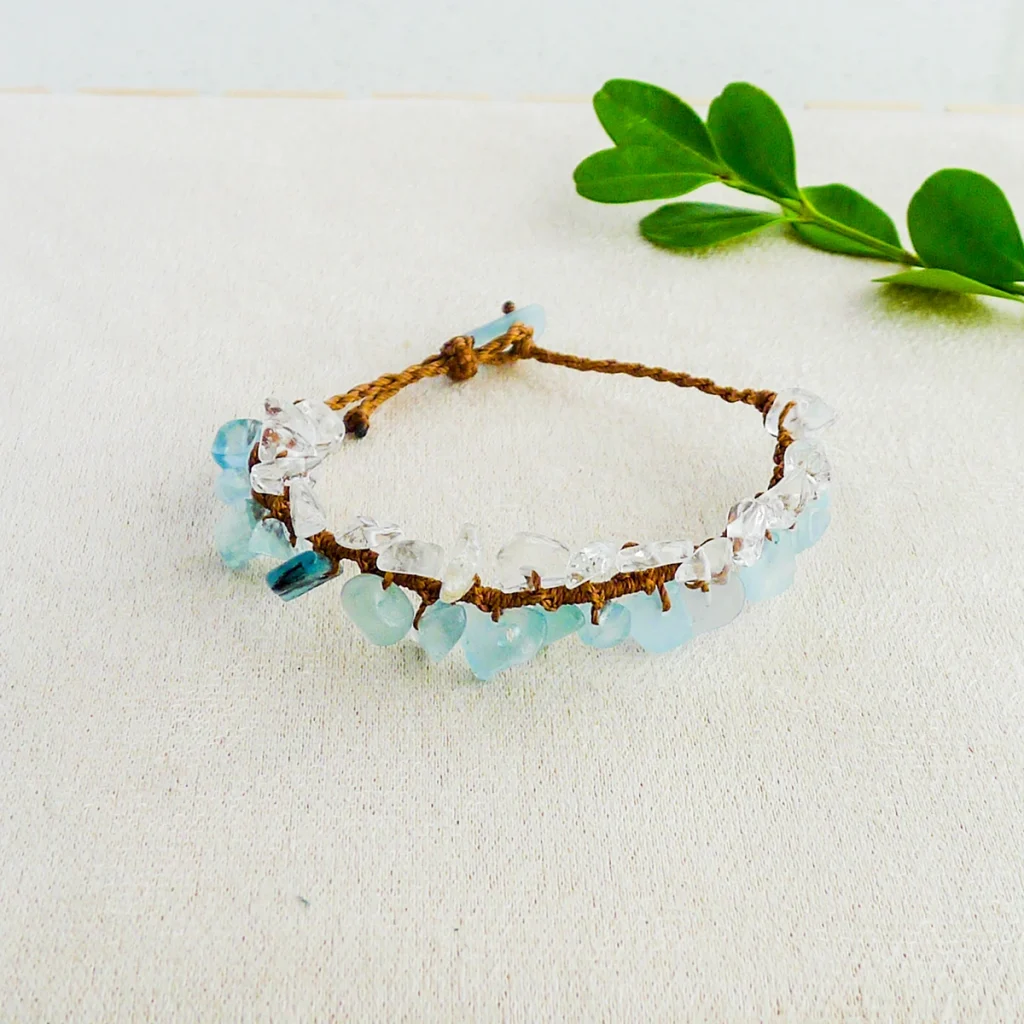 Natural aquamarine and clear quartz chip bracelet in a soft natural setting