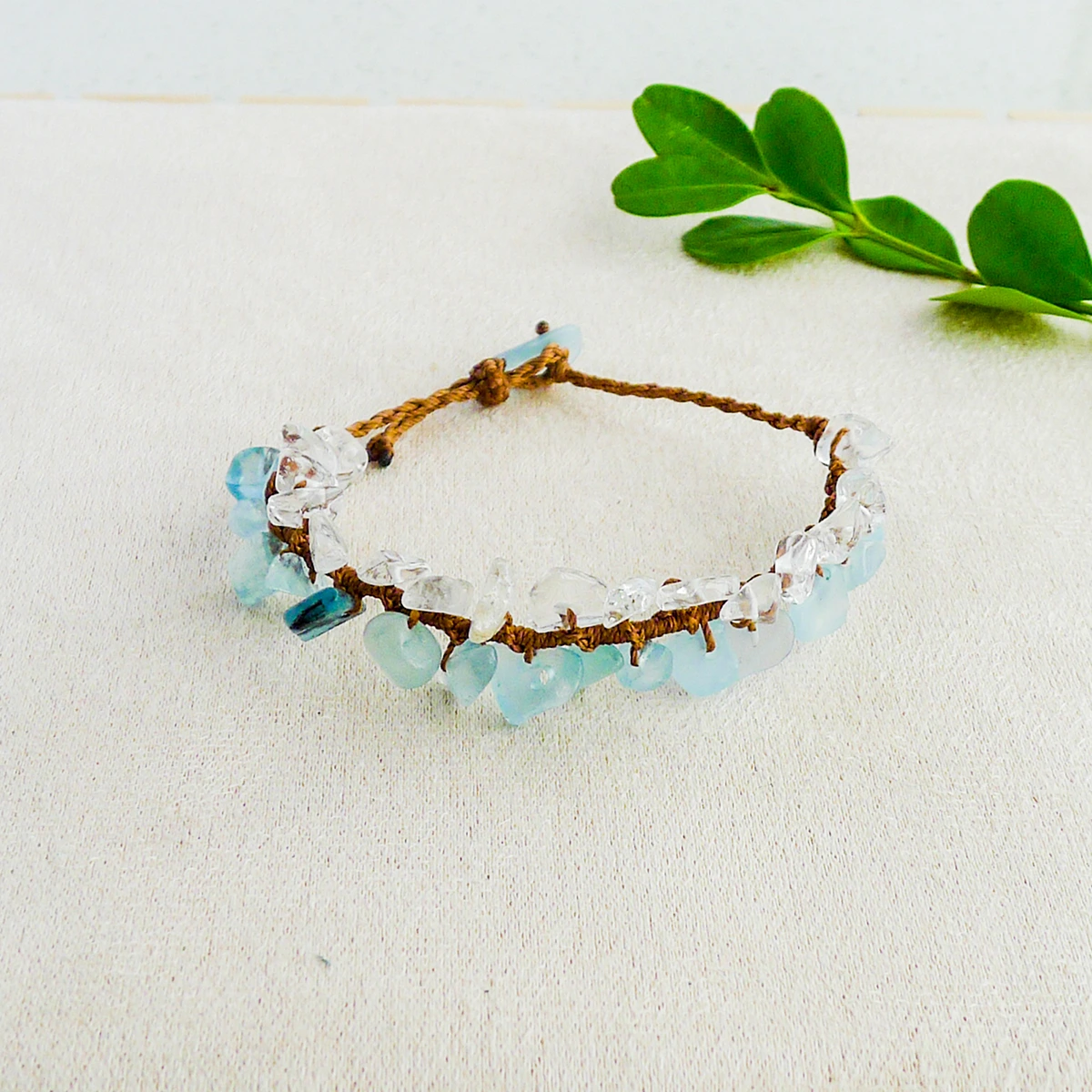 Natural aquamarine and clear quartz chip bracelet in a soft natural setting
