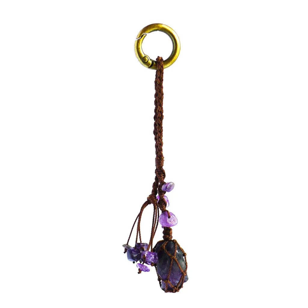 Violet Thread raw amethyst keychain photographed on a white background. Shows macrame cord, key ring, and amethyst stone detail.